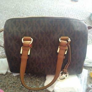 Michael Kors purse and a Steve Madden bag